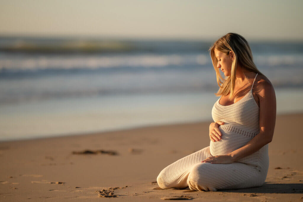 pregnancy women at the beach