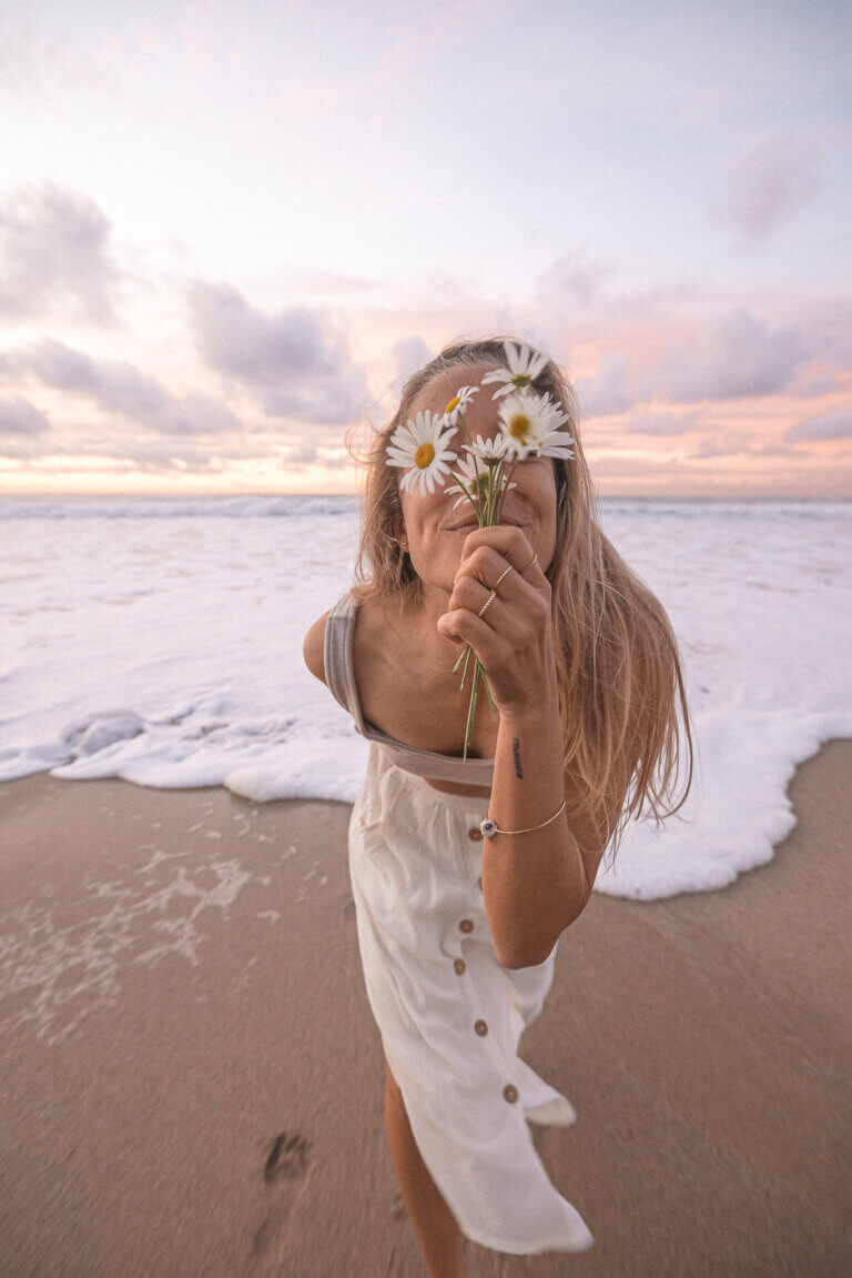 Women at the beach during sunset