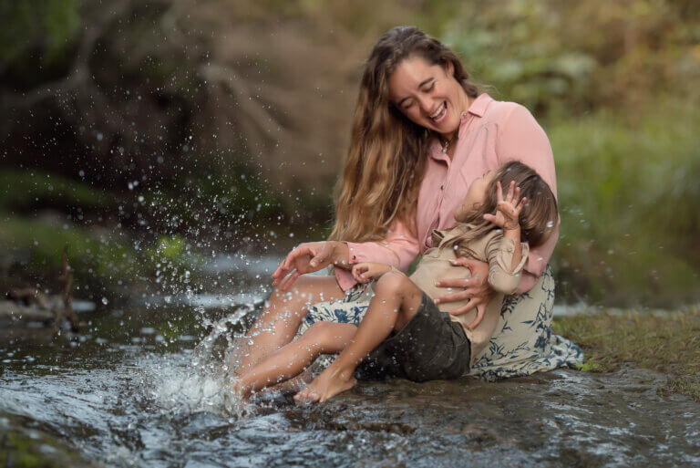 Mother and son playing with water photography